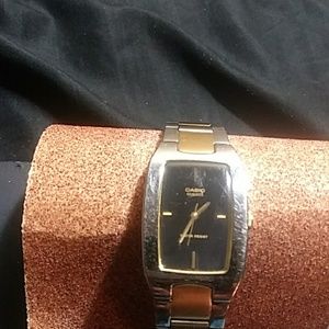 Gold and silver Casio watch that works